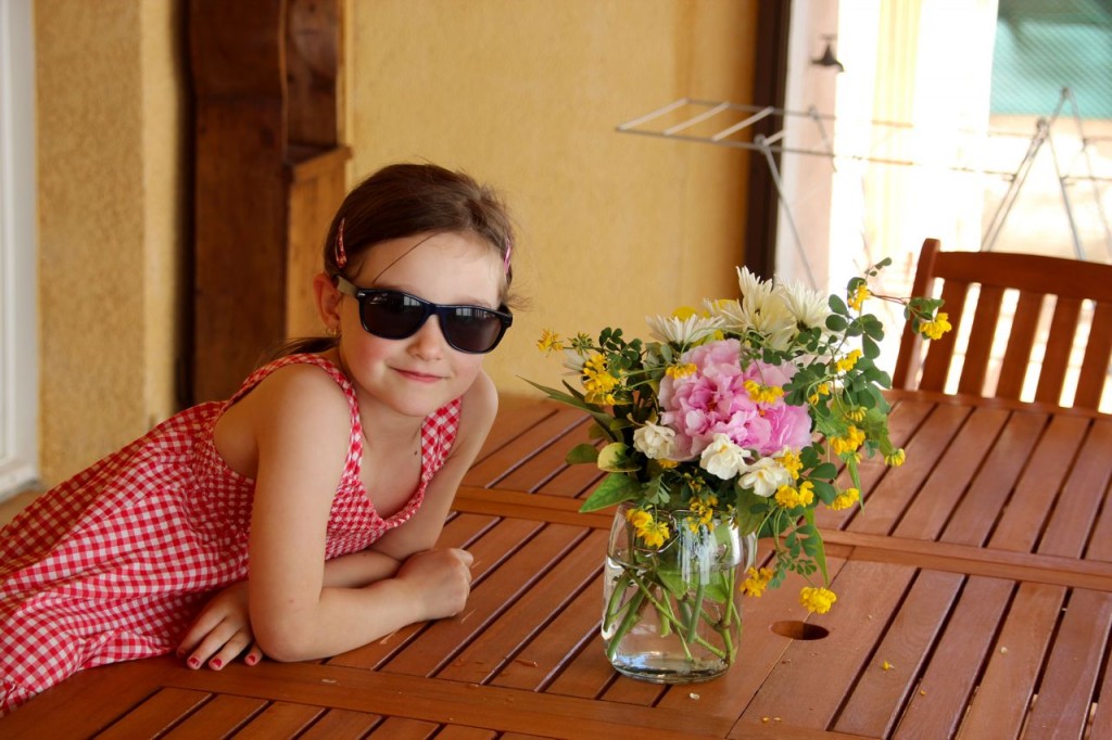 Angelina picking her first bouquets at new house