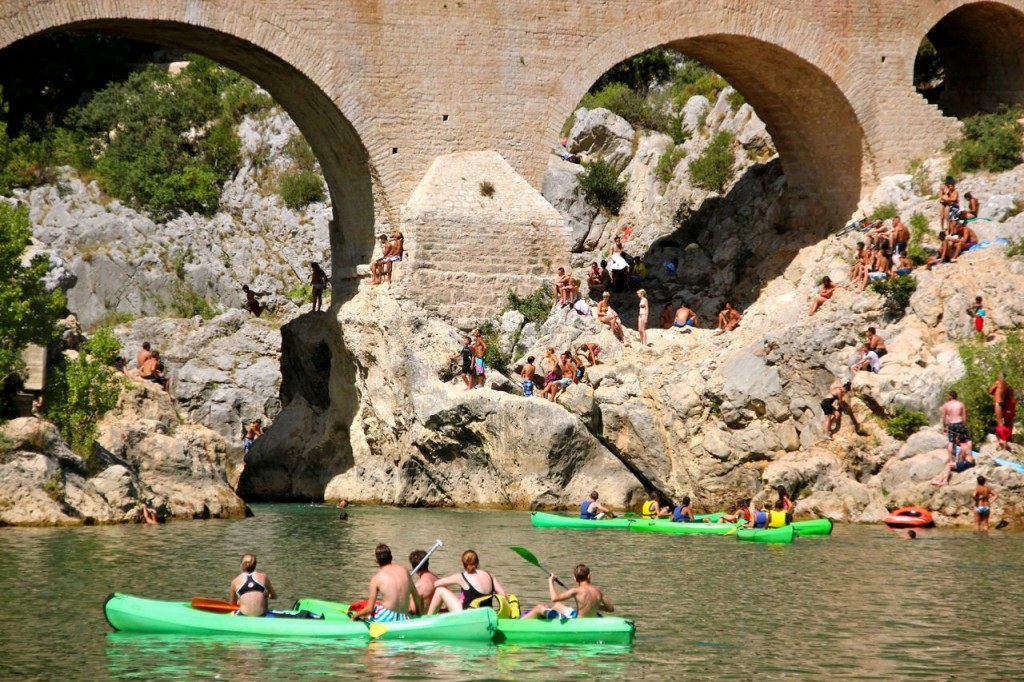 Canoers watching cliff jumpers 