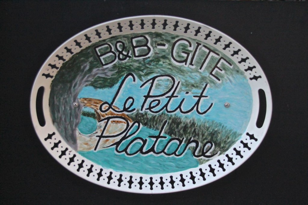 Le Petit Platane Sign