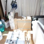 More boxes piled on the floor waiting for a home