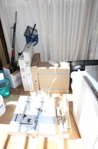 More boxes piled on the floor waiting for a home